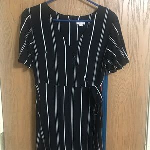 Black and white tie front dress